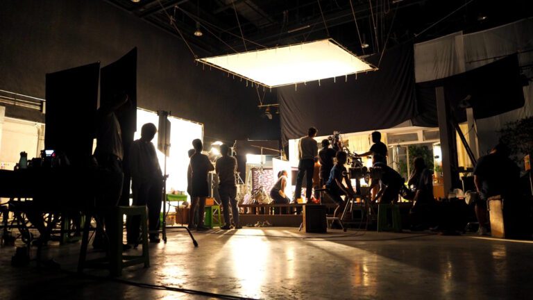 scenes-making-film-video-production-movie-crew-team-working-silhouette-camera-equipment-set-studio